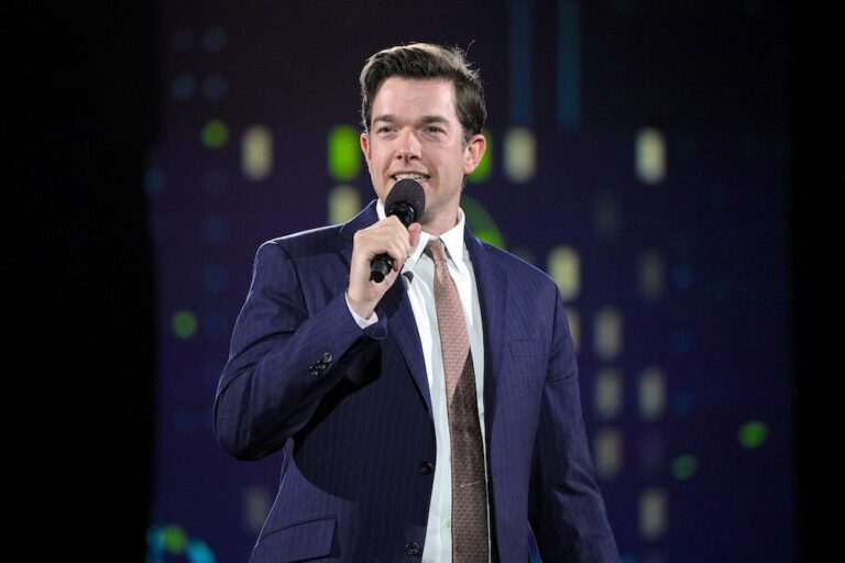 John Mulaney performs onstage