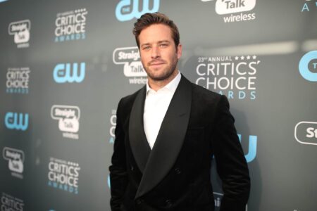Armie Hammer in a black blazer with a shawl lapel