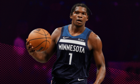 Anthony Edwards holding a basketball