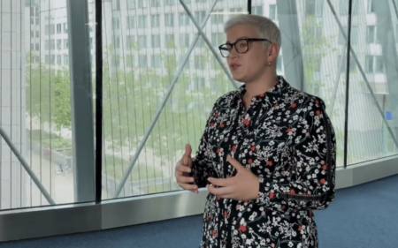 Maria Walsh speaking in the corridor of an office