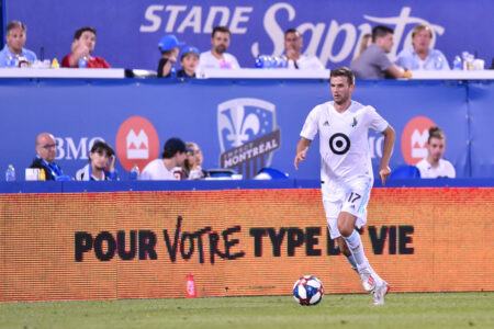 Collin Martin of Minnesota United FC runs the ball against the Montreal Impact during the MLS game at Saputo Stadium on July 6, 2019.