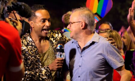 Anthony Albanese being interviewed at the Sydney Mardi Gras parade.