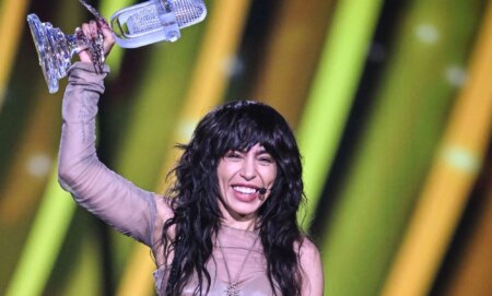 Loreen holds the Eurovision trophy after being named winner for the second time.