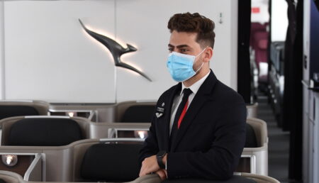 SYDNEY, AUSTRALIA - OCTOBER 28: A Qantas cabin crew member on board a Boeing 787 Dreamliner aircraft during a media visit on October 28, 2021 in Sydney, Australia. Australia's international borders will reopen from Monday November 1, with fully vaccinated international arrivals able to travel into New South Wales and Victoria without needing to quarantine. Australian citizens will also be able to freely travel overseas from 1 November without requiring an exemption from the federal government and Border Force. (Photo by James D. Morgan/Getty Images)