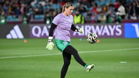 England goalkeeper Mary Earps kicks a football in an action shot