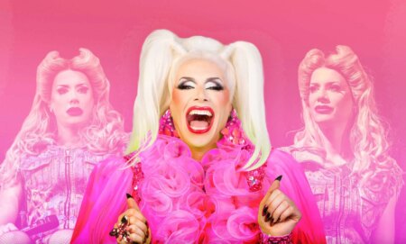 An image featuring Divina De Campo in a pink frilly top and blonde pigtails. She is laughing, while two images of her in Hedwig and the Angry Inch are in the background.