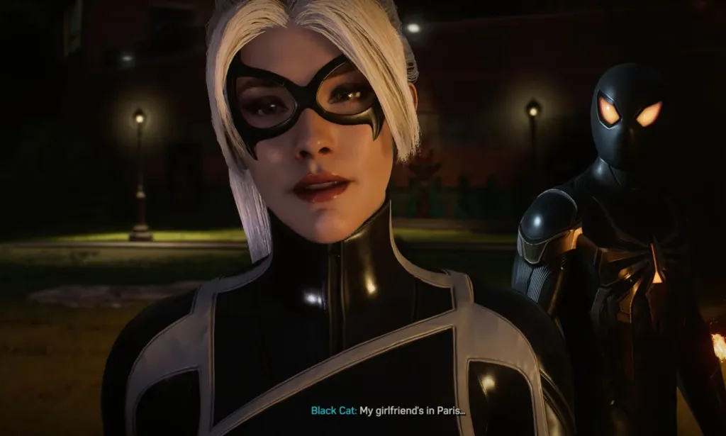 Une capture d'écran du jeu vidéo Marvel's Spider-Man 2 du personnage LGBTQ+ Black Cat, qui porte une tenue noire et blanche, discutant de sa petite amie