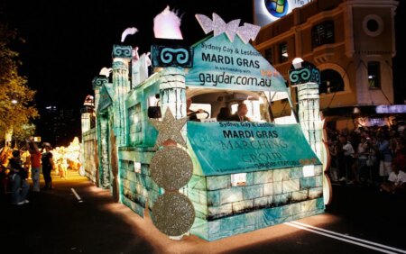 The Gaydar float makes its way along Oxford Street during the 2007 Sydney Gay and Lesbian Mardi Gras parade March 3, 2007 in Sydney, Australia. The float is bright and well lit against the dark background of the street, and looks like an ancient roman temple