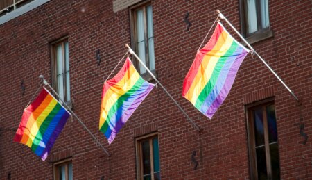 LGBT Pride flags on the side of a building