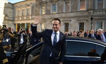 DUBLIN, IRELAND - DECEMBER 17: Fine Gael leader Leo Varadkar waves as he is congratulated by party members after being nominated as Taoiseach at Leinster House on December 17, 2022 in Dublin, Ireland. Leo Varadkar who previously held the post will take over as the newly appointed Taoiseach from Micheal Martin as part of a coalition agreement between the two political parties, Fianna Fail and Fine Gael following the last election which resulted in a hung government. (Photo by Charles McQuillan/Getty Images)