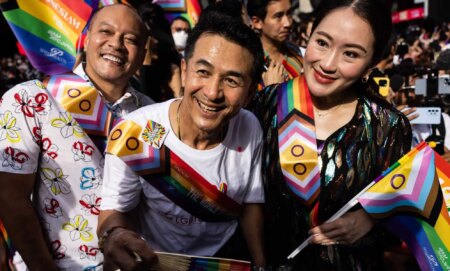 BANGKOK, THAILAND - JUNE 04: (L-R) Nattawut Saikua, Chonlanan Srikaew, and Paetongtarn Shinawatra, members of the Pheu Thai party, attend a Pride parade on June 04, 2023 in Bangkok, Thailand. Members of the LGBTQ community and allies take part in a Pride month march through central Bangkok. (Photo by Lauren DeCicca/Getty Images)