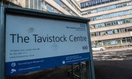 A sign outside of the Tavistock and Portman NHS Foundation Trust, which houses England