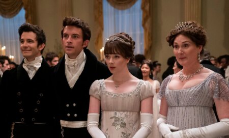 Luke Thompson as Benedict Bridgerton, Jonathan Bailey as Anthony Bridgerton, Claudia Jessie as Eloise Bridgerton, Ruth Gemmell as Lady Violet Bridgerton in Bridgerton season two.
