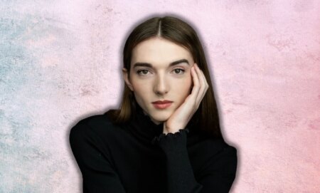 Mary Malone against a textured blue and pink background