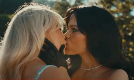 Sabrina Carpenter and Jenna Ortega kissing in Taste Music Video
