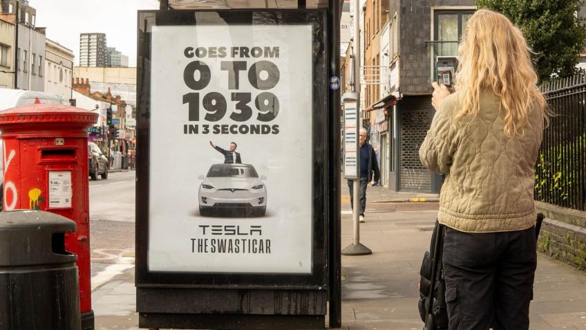 A poster at a London bus stop reading