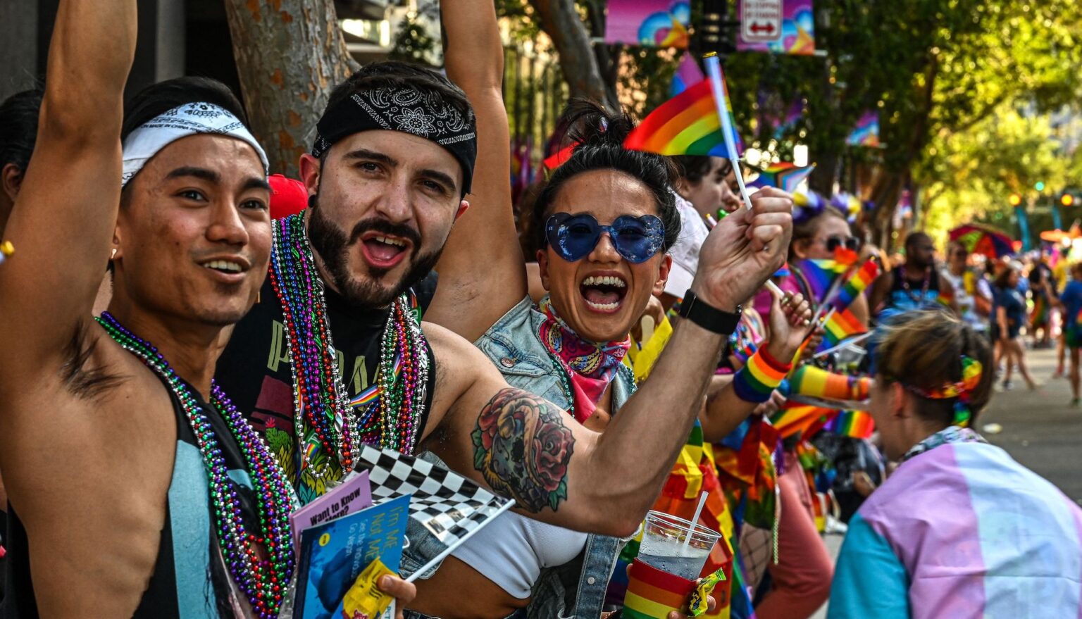 People attend a Pride Parade, in Orlando, Florida on October 15, 2022. (Photo by Giorgio VIERA / AFP) (Photo by GIORGIO VIERA/AFP via Getty Images)