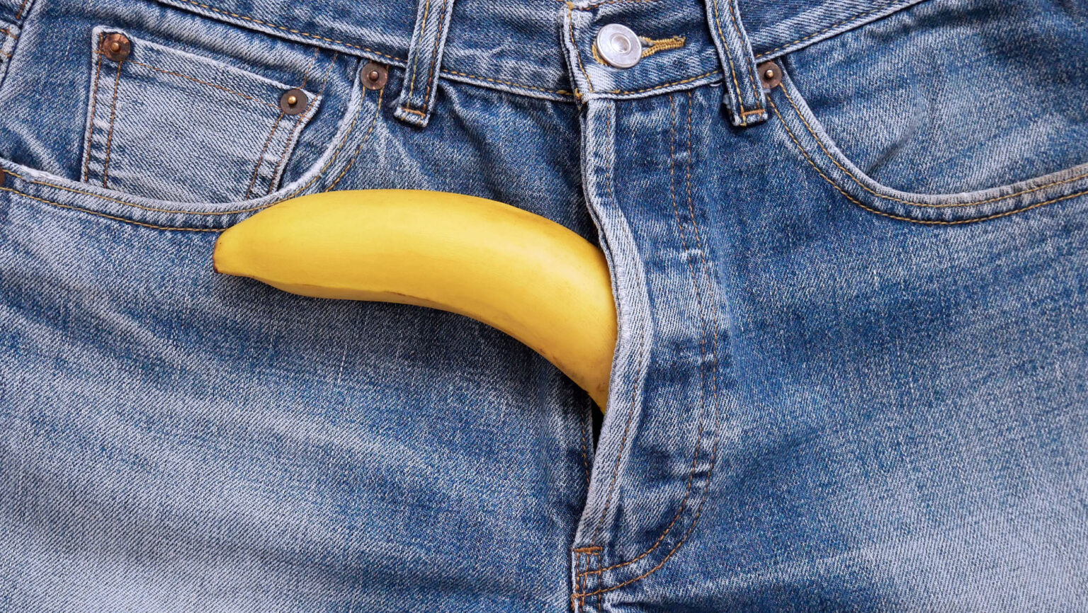 Banana sticking out of men's jeans