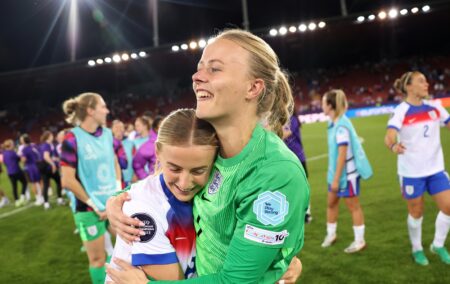 Hannah Hampton of England celebrates with team mate Chloe Kelly after the team