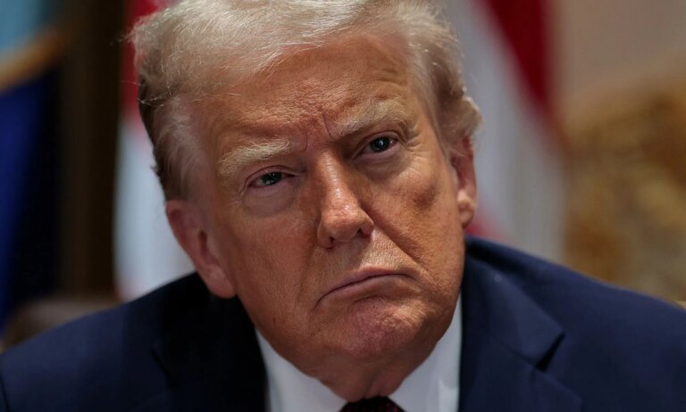 Le juge ordonne à Trump de restaurer des centaines de pages Web de diversité, d'équité et d'inclusion Donald Trump, pictured tilting his head.