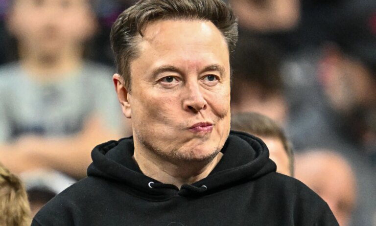 Elon Musk, pictured pursing his lips.