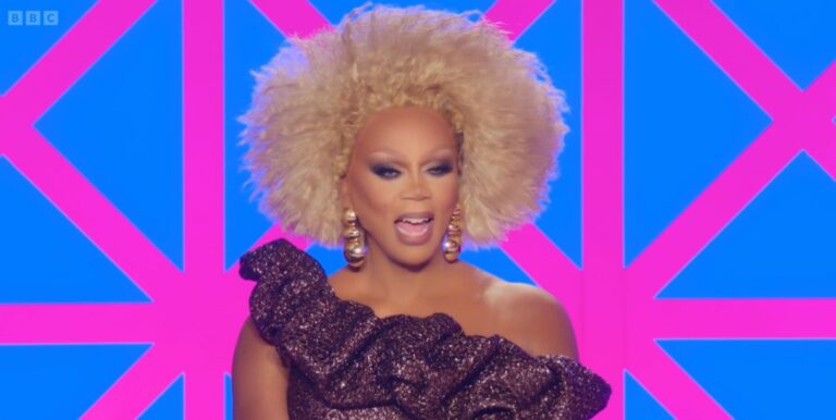 RuPaul on the Drag Race UK judging panel laughing.
