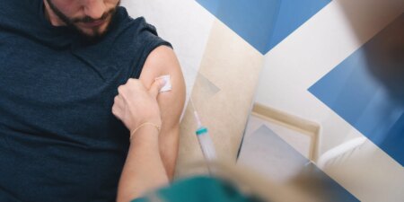 man having injection