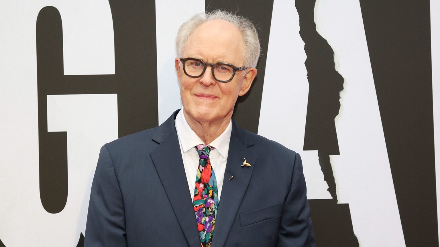 John Lithgow dit que les opinions de JK Rowling ont été « déformées » lors du redémarrage de « Harry Potter » Logo