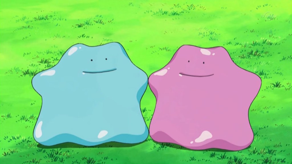 L'image montre deux Pokémon en forme de goutte, un bleu, un violet, debout sur l'herbe.